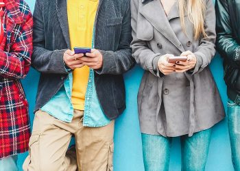 Group,of,friends,using,smart,mobile,phones,app, ,teenagers